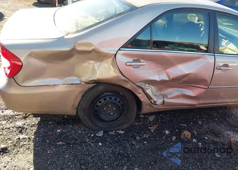 2003 Toyota Camry Xle z USA, uszkodzony, nr VIN 4T1BE32K03U161421